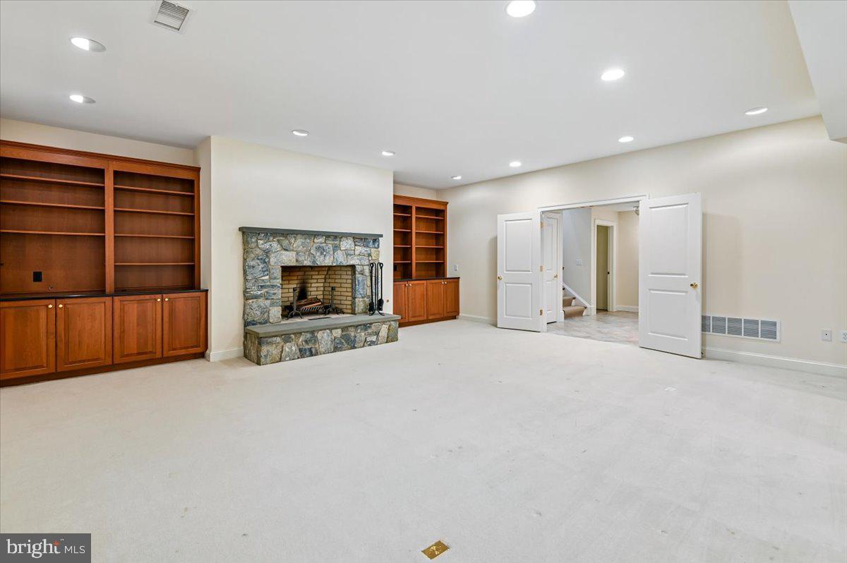 2700 Falling Timber Trail Edgewater, MD 21037 - Photo 60 of 89 Family room with built-ins and fireplace