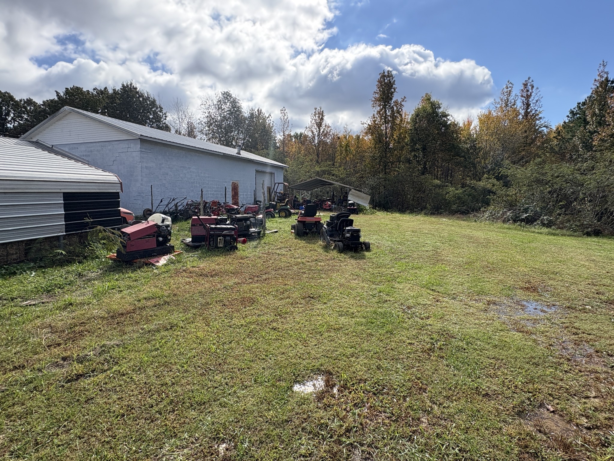 106 Cotham Road Hohenwald, TN 38462 - Photo 13 of 14 a backyard of a house with fire pit and outdoor seating