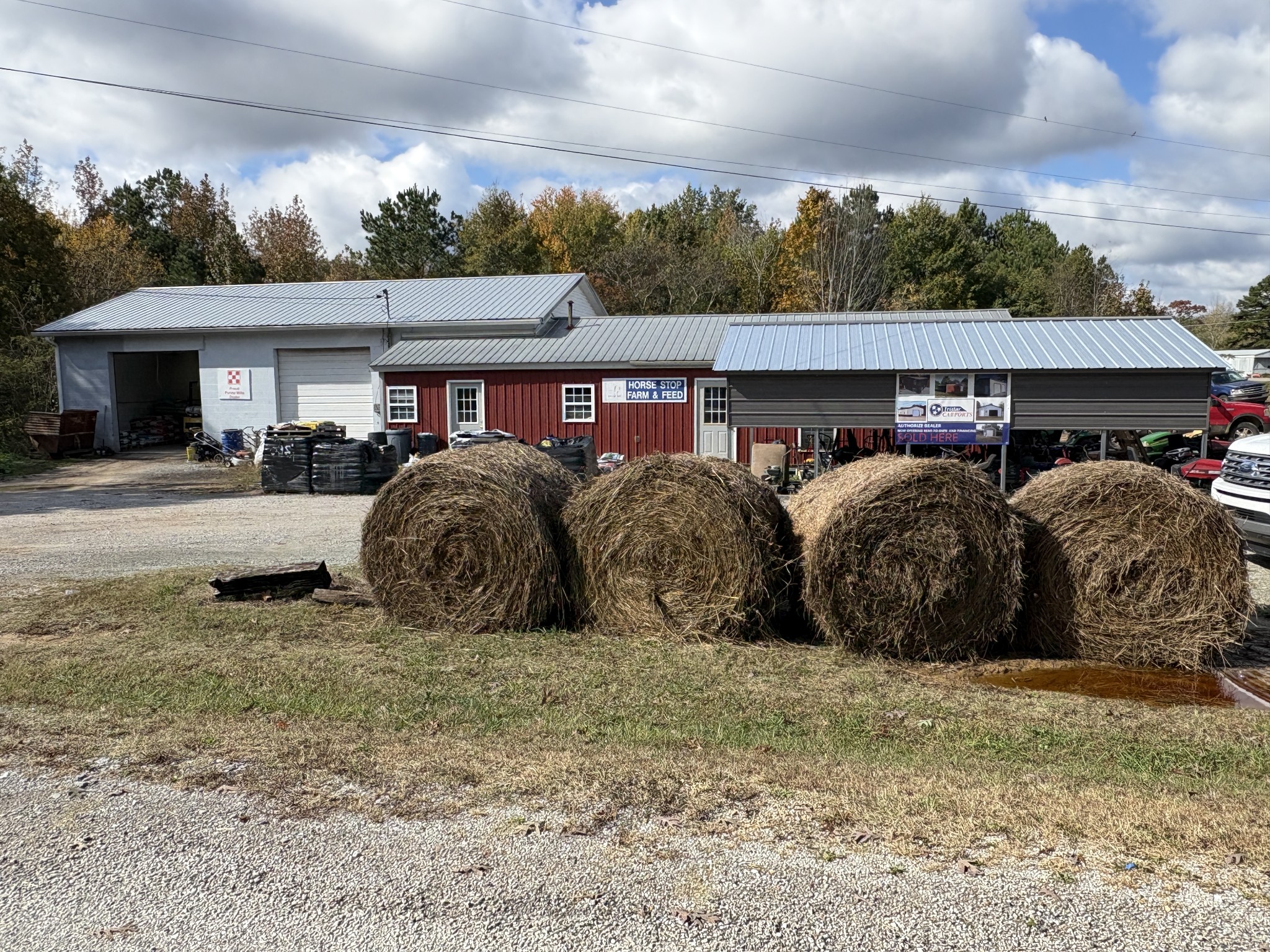 106 Cotham Road Hohenwald, TN 38462 - Photo 4 of 14 a view of a yard that has a lot of cars parked in it