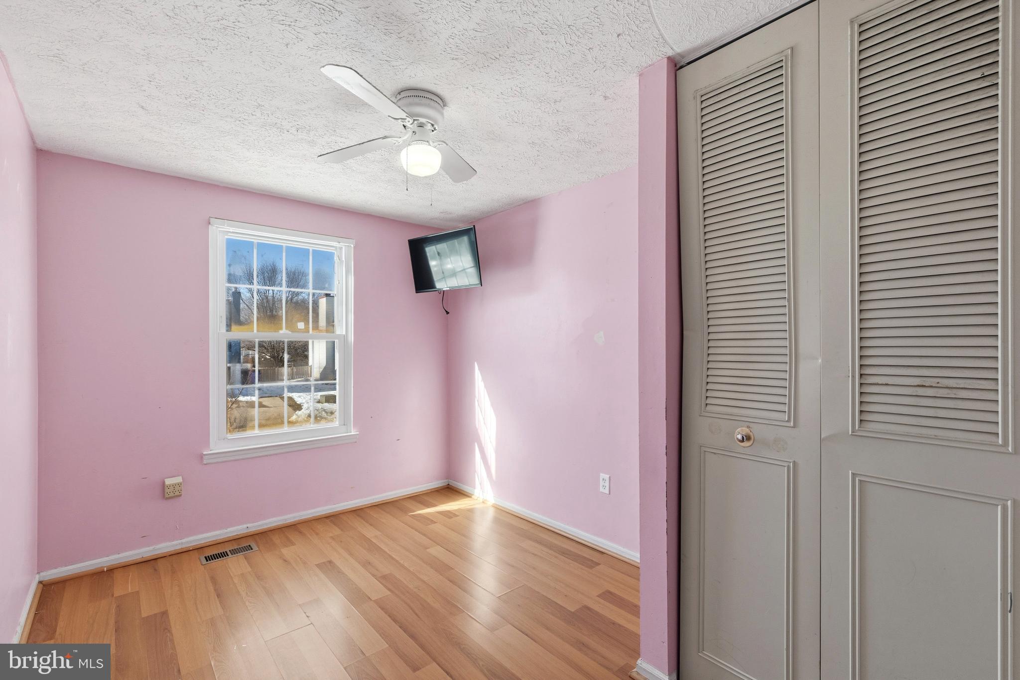 721 Rainbow Court Edgewood, MD 21040 - Photo 12 of 25 a view of an empty room with a window and a dresser