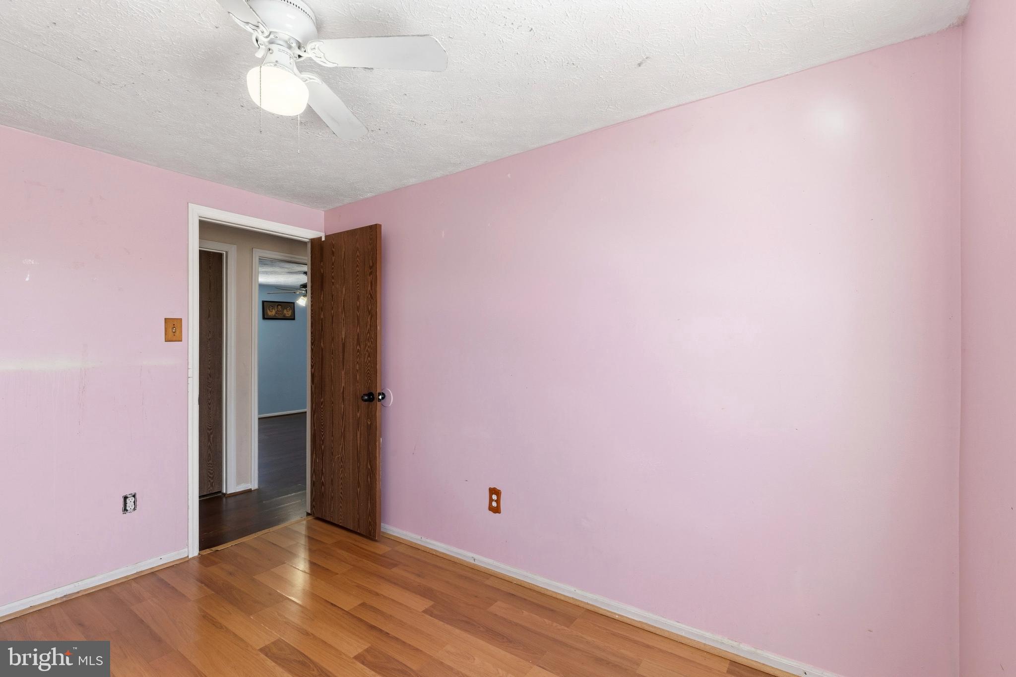 721 Rainbow Court Edgewood, MD 21040 - Photo 13 of 25 a view of an empty room with wooden floor