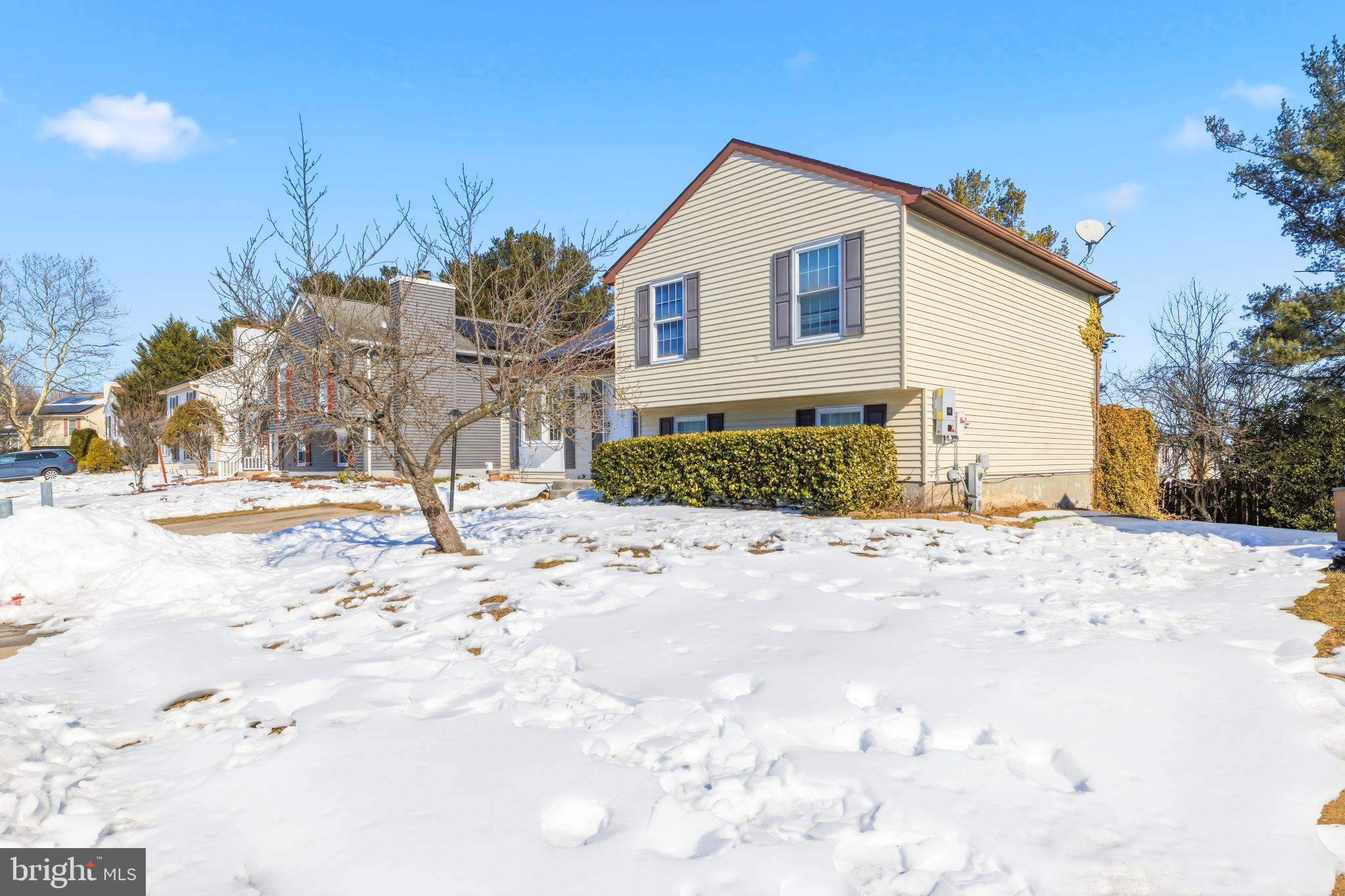 721 Rainbow Court Edgewood, MD 21040 - Photo 2 of 25 a view of a house with snow on the road