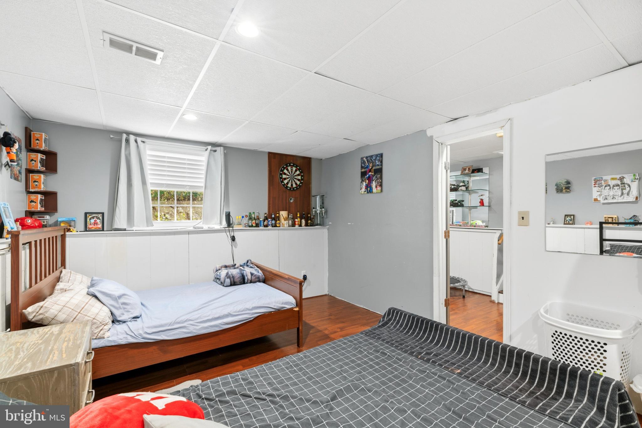 721 Rainbow Court Edgewood, MD 21040 - Photo 22 of 25 a bedroom with furniture and a window