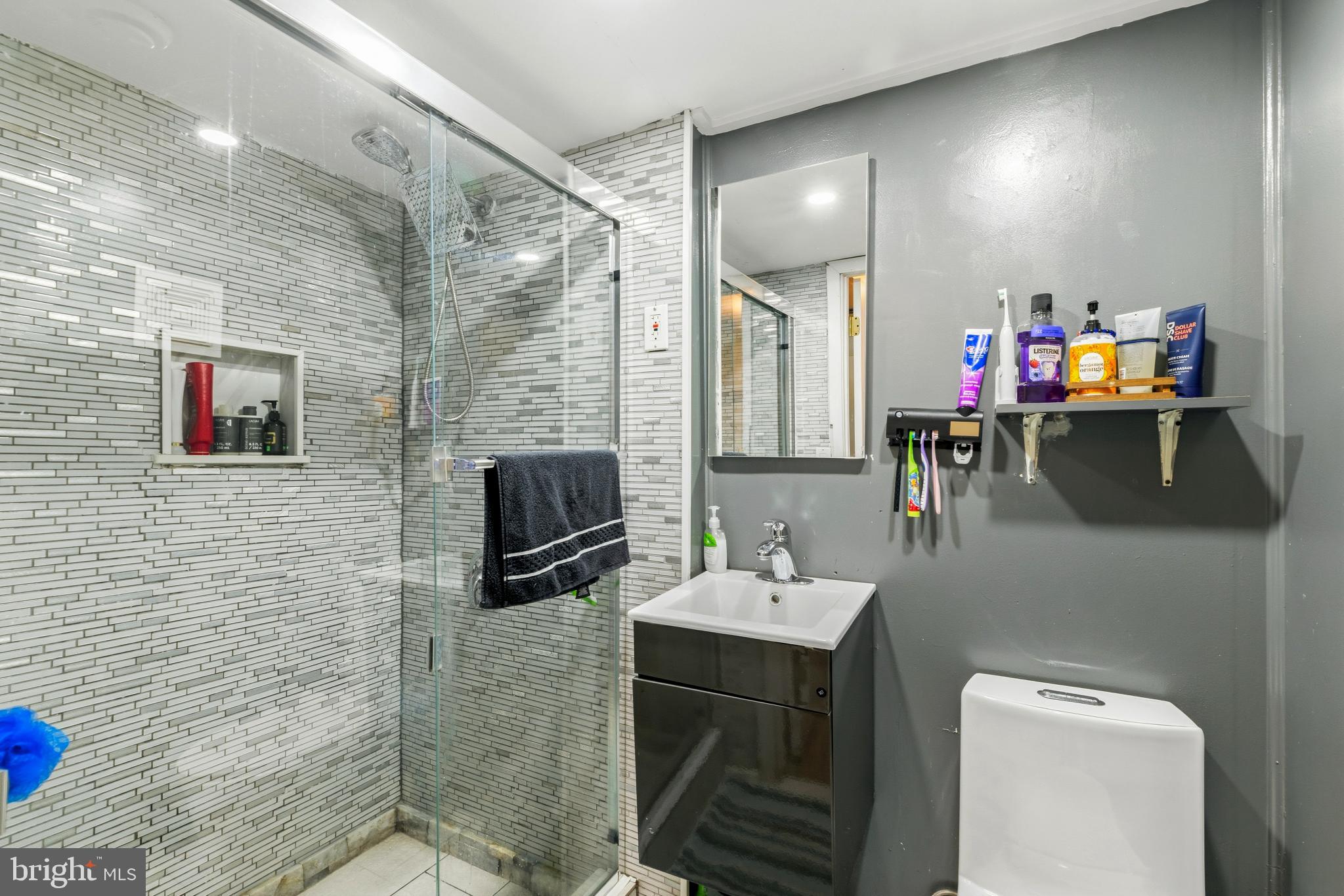 721 Rainbow Court Edgewood, MD 21040 - Photo 23 of 25 a bathroom with a sink a toilet and a mirror