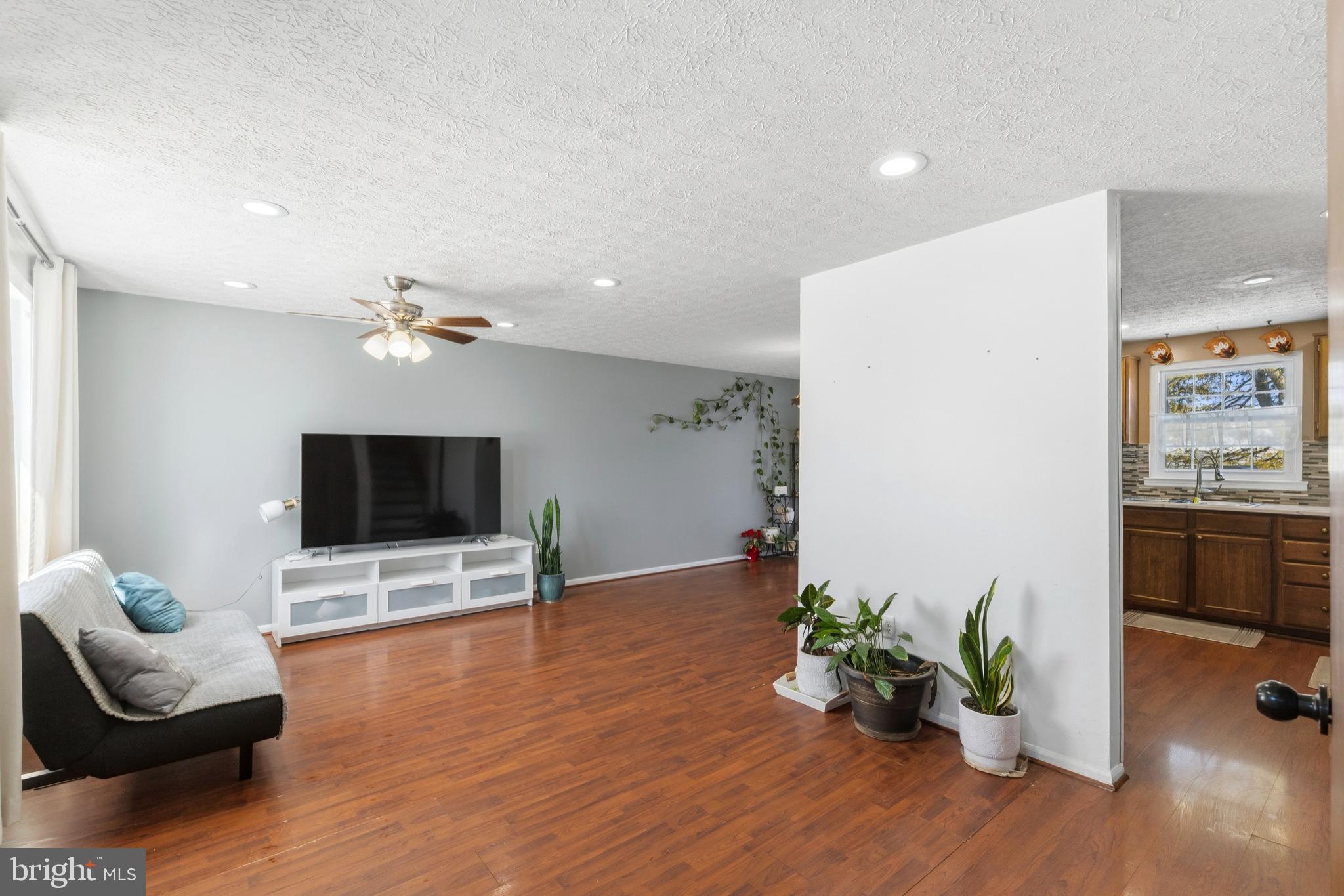 721 Rainbow Court Edgewood, MD 21040 - Photo 3 of 25 a living room with furniture and a flat screen tv