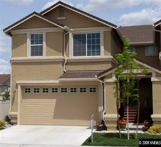 1865 Thousand Acres Way Reno, NV 89521 - Photo 1 of 6 a front view of a house with garden