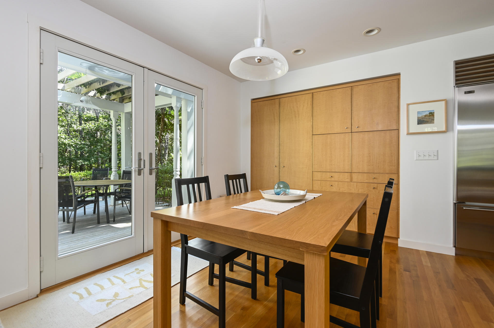 245 Cahoon Hollow Road Wellfleet, MA 02667 - Photo 11 of 36 a view of a dining room with furniture window and outside view