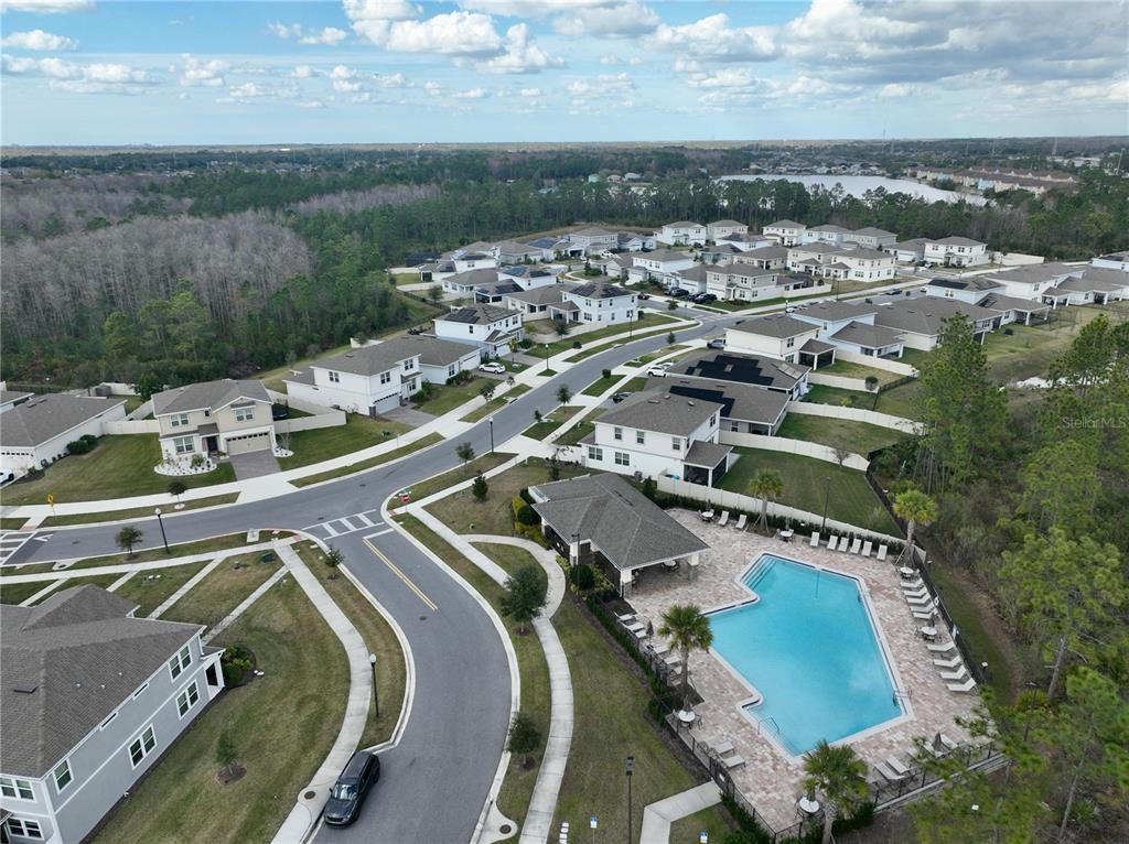 10923 Leafshore Loop Orlando, FL 32829 - Photo 40 of 44 an aerial view of a house with a garden and lake view
