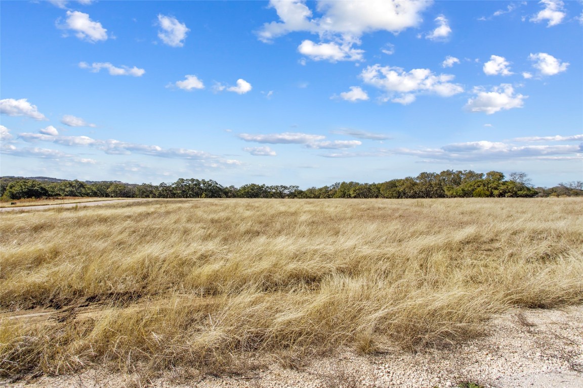 Tbd Purple Sage Trail Blanco, TX 78606 - Photo 19 of 26 a view of a lake with sunset in background