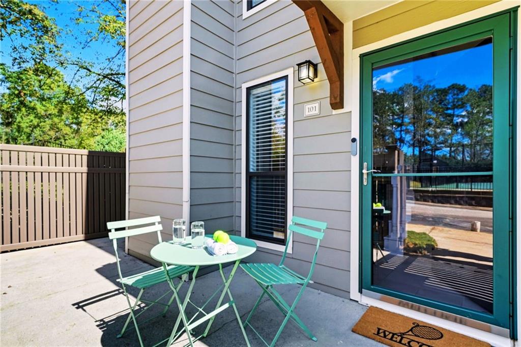 101 Park Ridge Circle Marietta, GA 30068 - Photo 2 of 52 a view of a chairs and table in the balcony