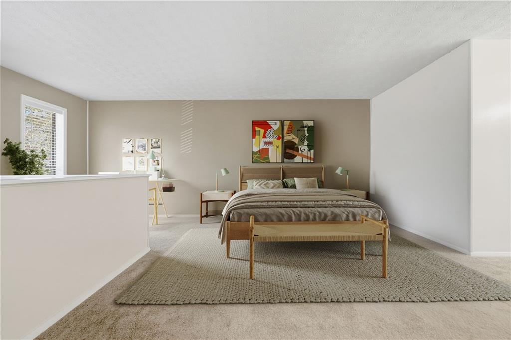 101 Park Ridge Circle Marietta, GA 30068 - Photo 21 of 52 a bedroom with a bed and a table