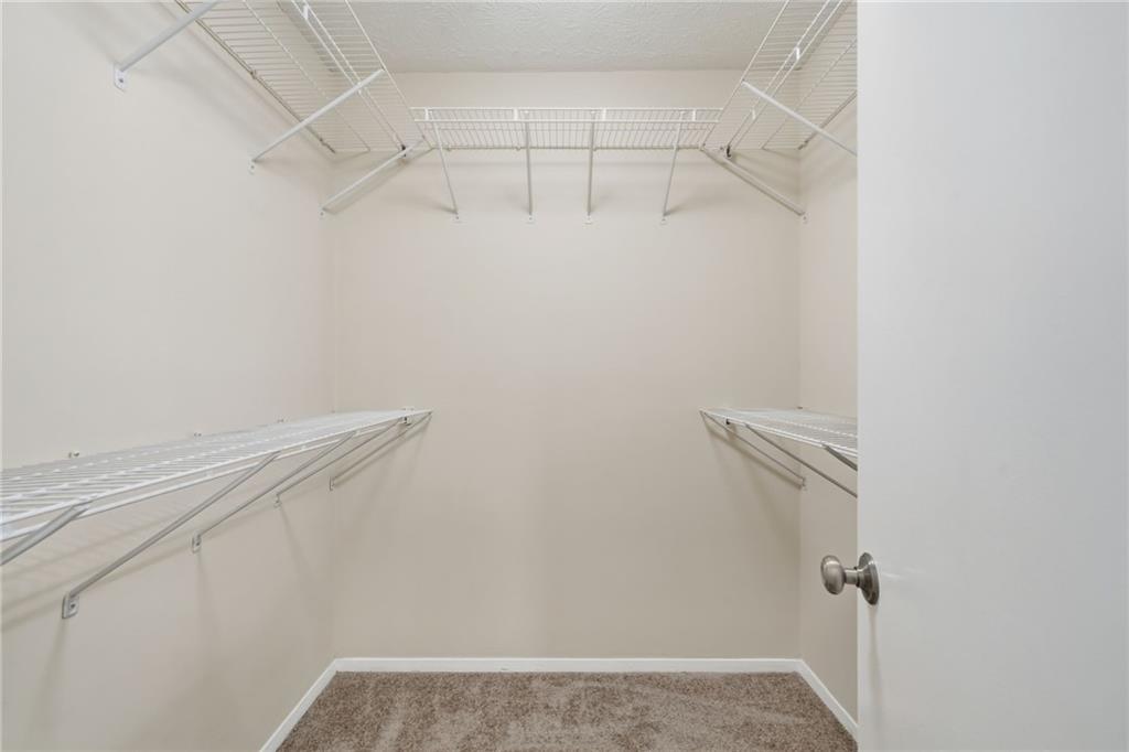 101 Park Ridge Circle Marietta, GA 30068 - Photo 25 of 52 a view of a room with racks on the wall