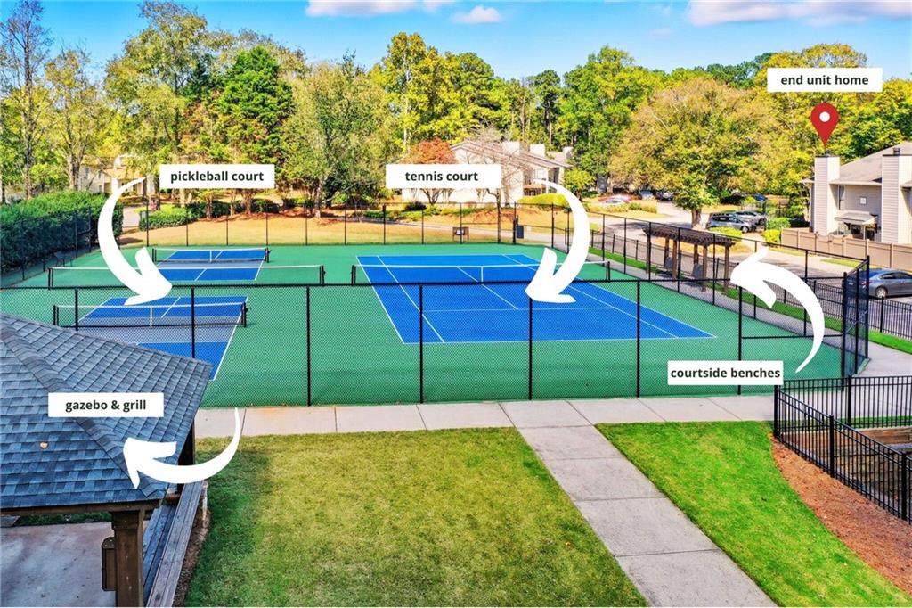 101 Park Ridge Circle Marietta, GA 30068 - Photo 28 of 52 a view of a park with swings and slides