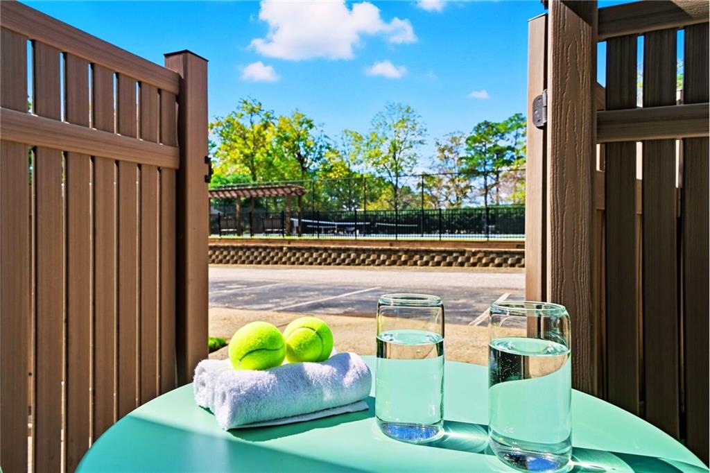 101 Park Ridge Circle Marietta, GA 30068 - Photo 3 of 52 a balcony with table and chairs