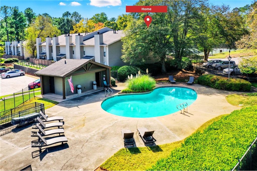 101 Park Ridge Circle Marietta, GA 30068 - Photo 40 of 52 a view of a swimming pool with a patio