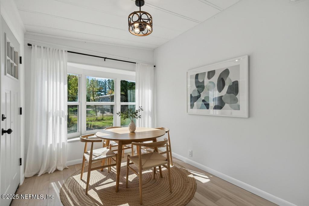 560 Quarter Horse Lane Bunnell, FL 32110 - Photo 12 of 66 a view of a dining room with furniture window and outside view