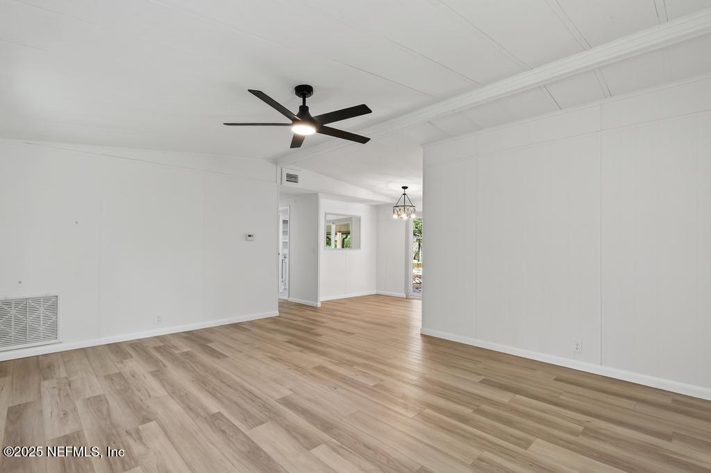 560 Quarter Horse Lane Bunnell, FL 32110 - Photo 33 of 66 wooden floor in an empty room
