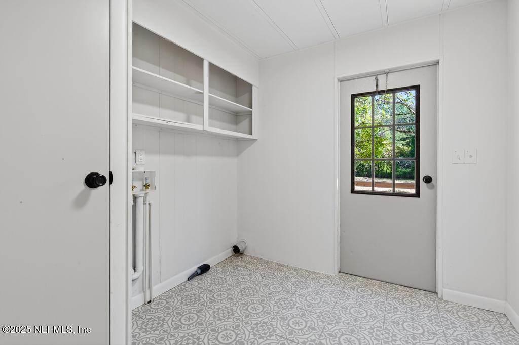 560 Quarter Horse Lane Bunnell, FL 32110 - Photo 40 of 66 a view of an empty room with a window