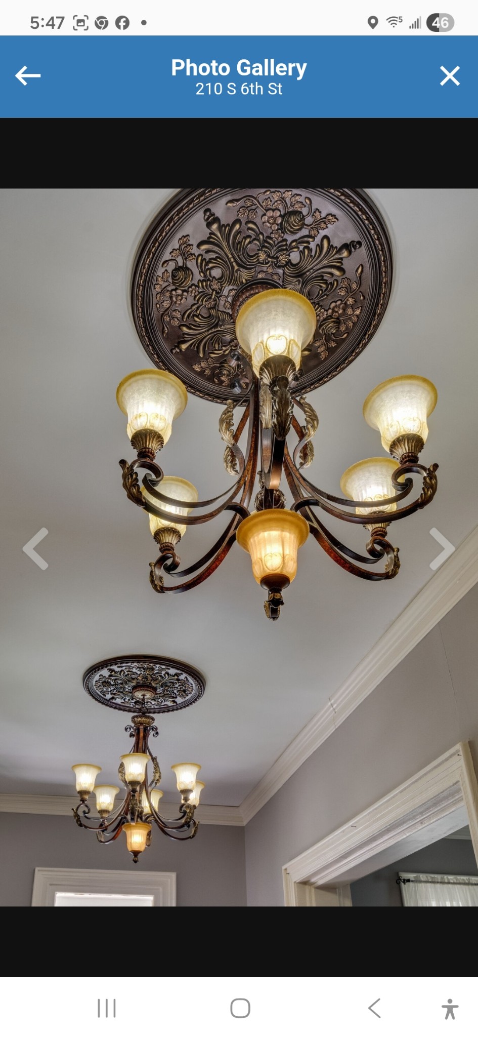 210 South 6th Street Pulaski, TN 38478 - Photo 11 of 44 a picture of a living room with furniture and chandelier