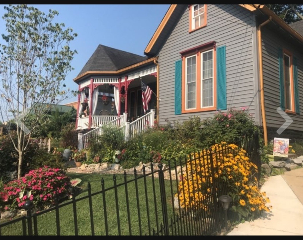 210 South 6th Street Pulaski, TN 38478 - Photo 40 of 44 a front view of a house with a garden
