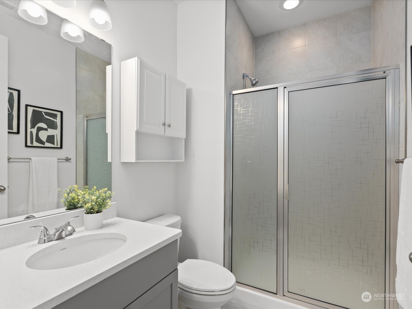 9752 Prospect Place Gig Harbor, WA 98332 - Photo 22 of 40 a bathroom with a sink toilet and shower