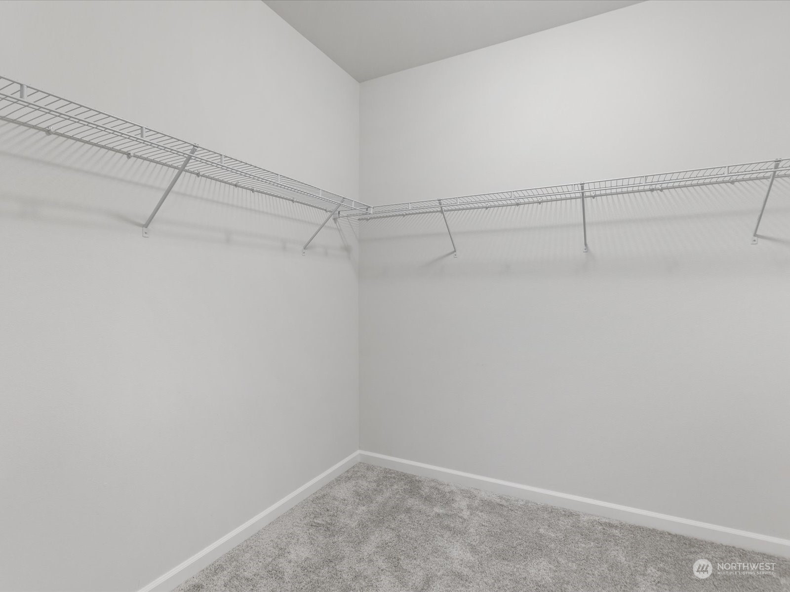 9752 Prospect Place Gig Harbor, WA 98332 - Photo 35 of 40 a view of a room with racks on the wall