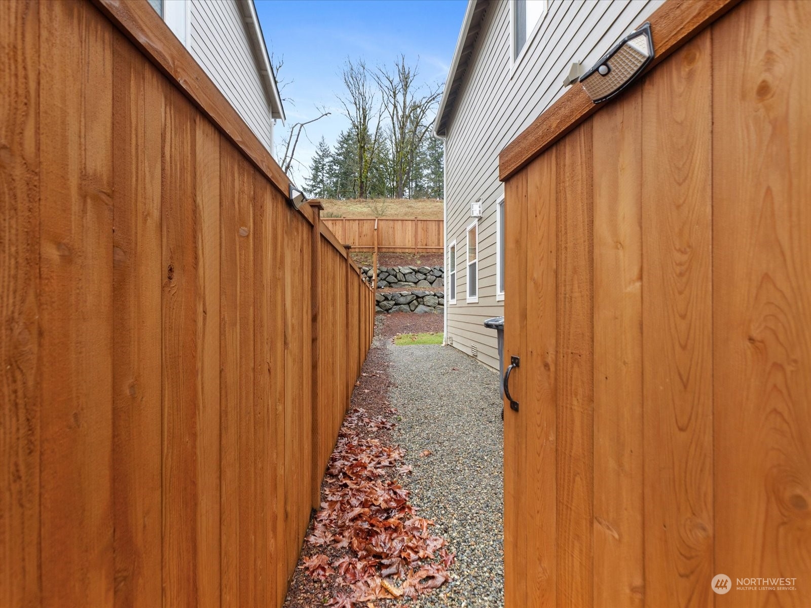 9752 Prospect Place Gig Harbor, WA 98332 - Photo 37 of 40 a view of a wooden door