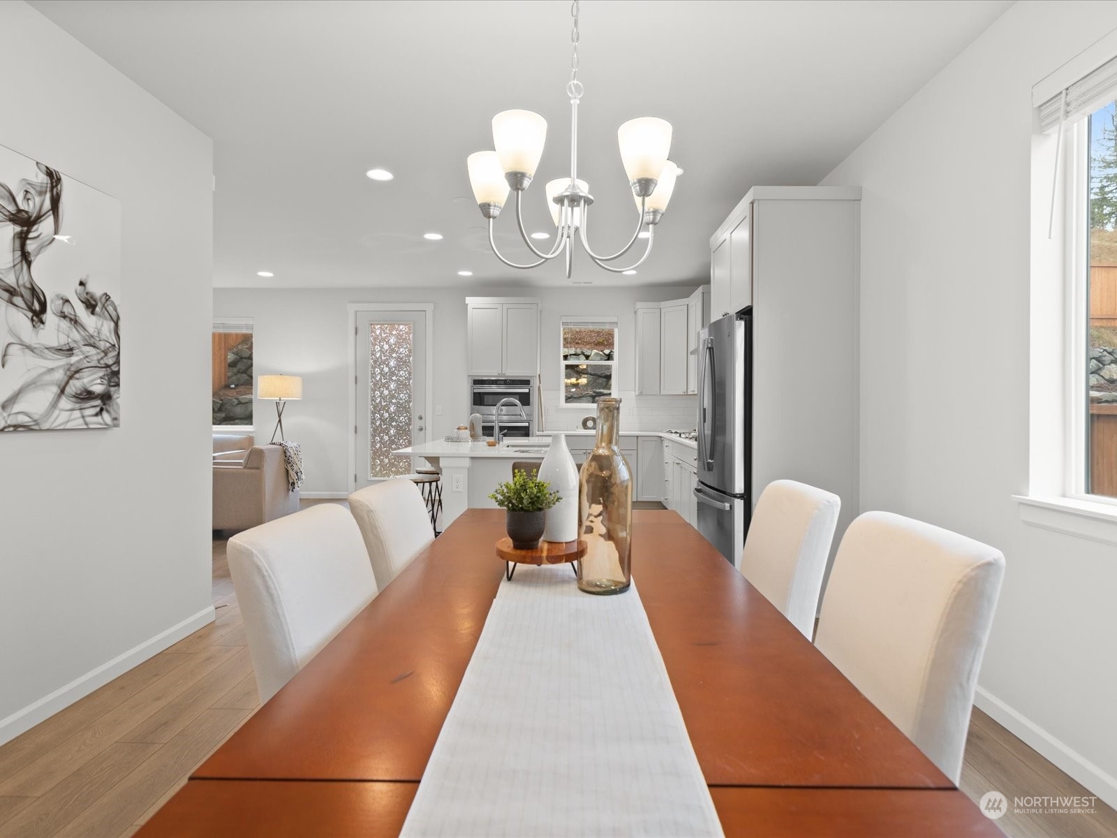 9752 Prospect Place Gig Harbor, WA 98332 - Photo 7 of 40 a view of a dining room with furniture