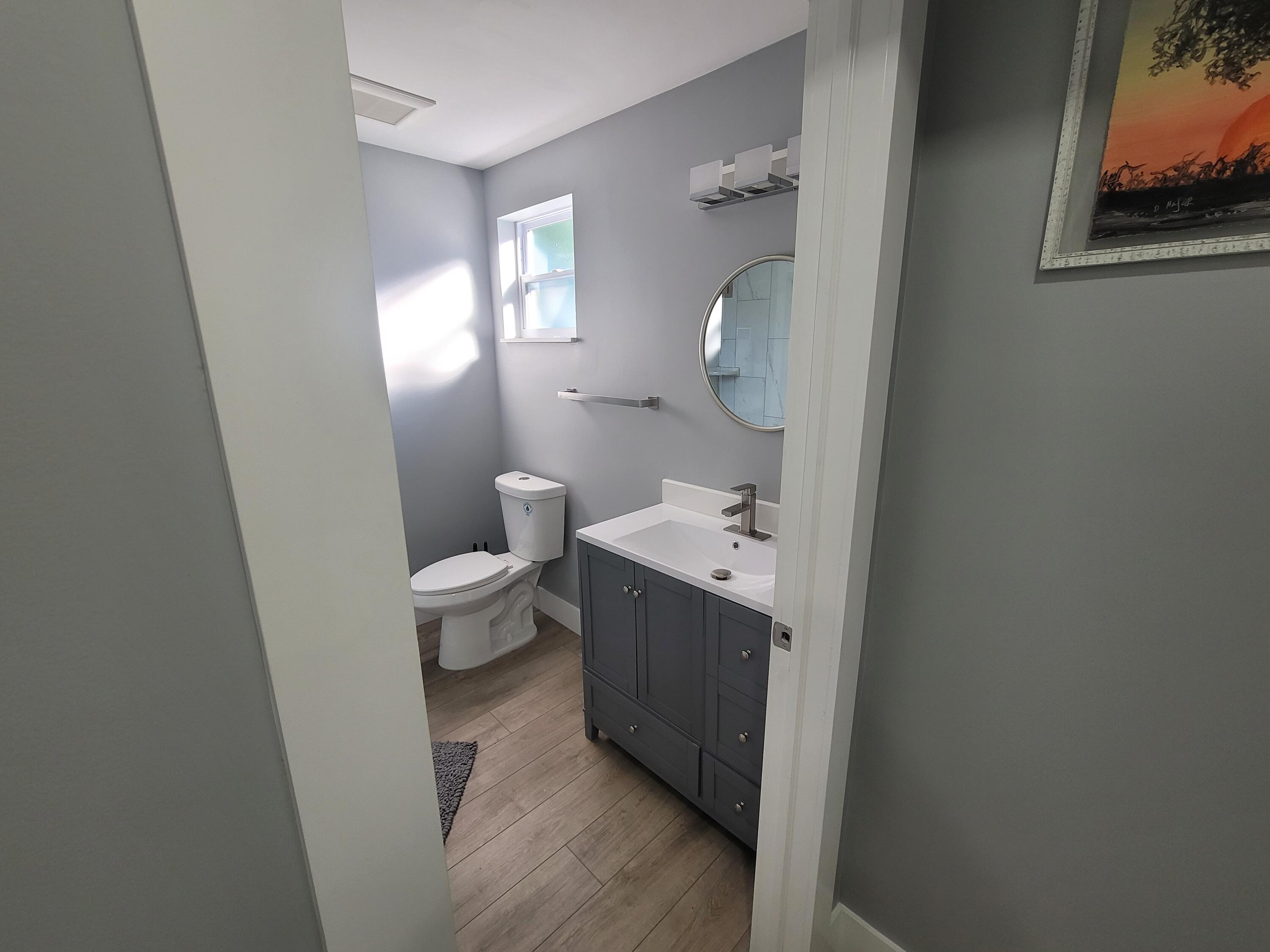 106 East Chandler Road Cloud Lake, FL 33406 - Photo 6 of 10 a view of a bathroom from a bathroom