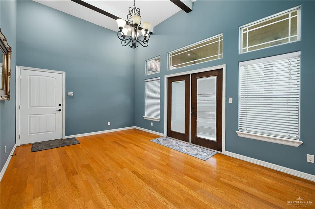 1236 Chloe Rae Circle Weslaco, TX 78599 - Photo 12 of 30 a view of a livingroom with a chandelier fan and a window