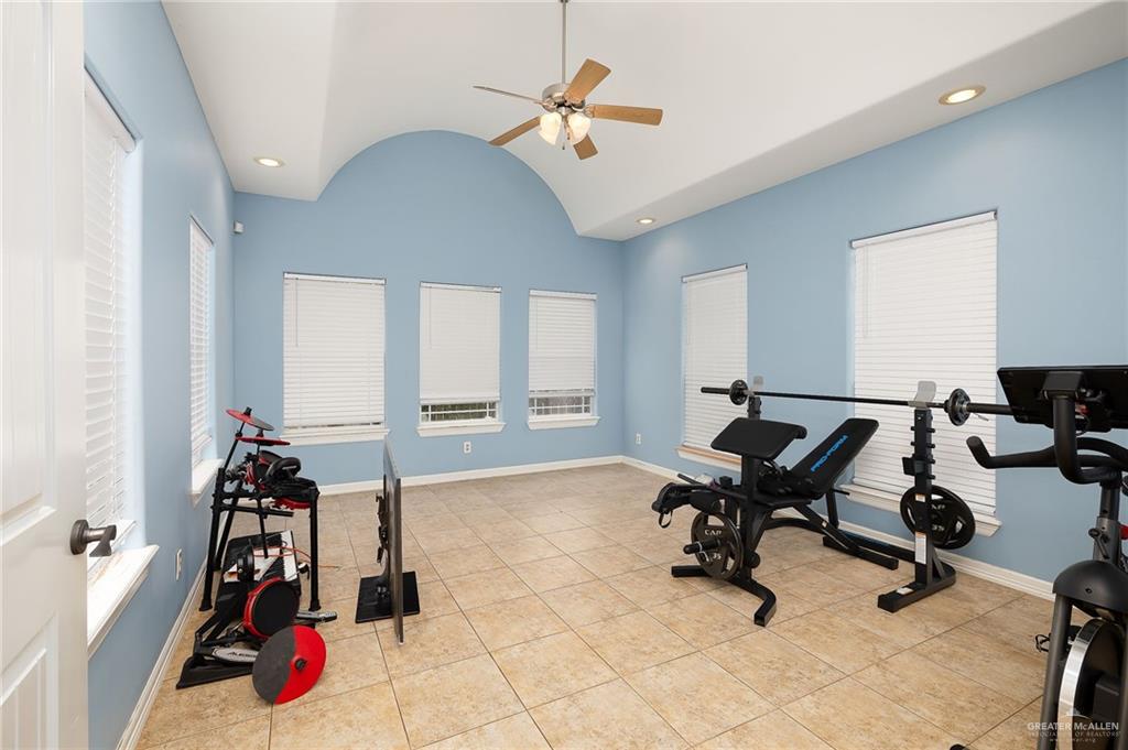 1236 Chloe Rae Circle Weslaco, TX 78599 - Photo 15 of 30 a view of a workspace with furniture and a window