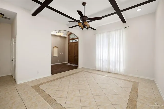 a view of a hallway with a chandelier
