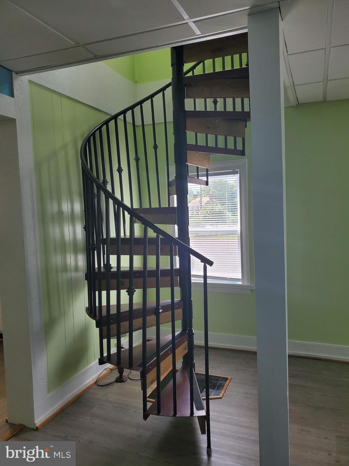 448 Ridgeview Road, Unit 3 Brightwood, VA 22715 - Photo 13 of 25 Spiral stairs to upstairs primary bedroom