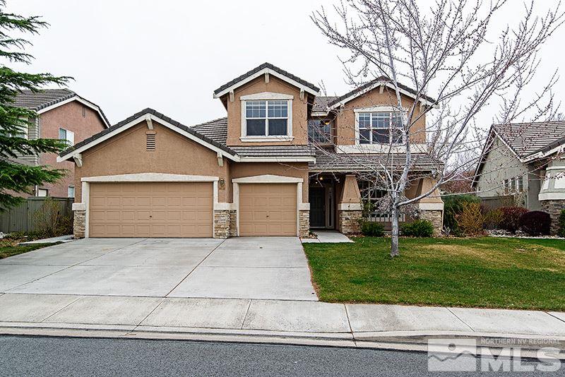 9535 Oakley Lane Reno, NV 89521 - Photo 1 of 1 front view of a house with a yard