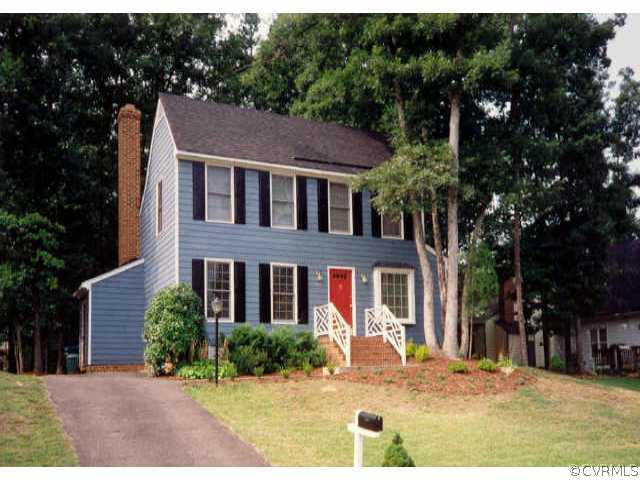 1606 Abbot's Mill Way Midlothian, VA 23114 - Photo 1 of 1 a view of a white house with a large tree and plants