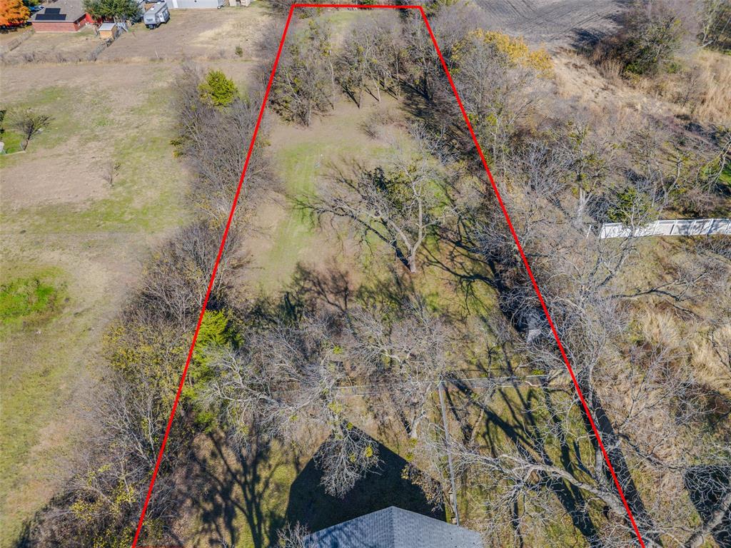 a view of a backyard of a house