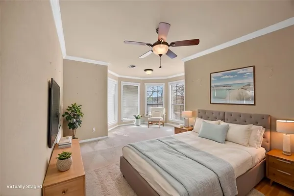 a bedroom with bed and window