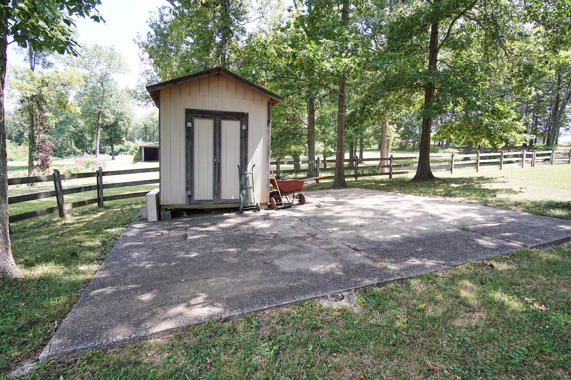 984 Claude Jones Road Murfreesboro, TN 37129 - Photo 39 of 49 a view of a house with backyard and a tree