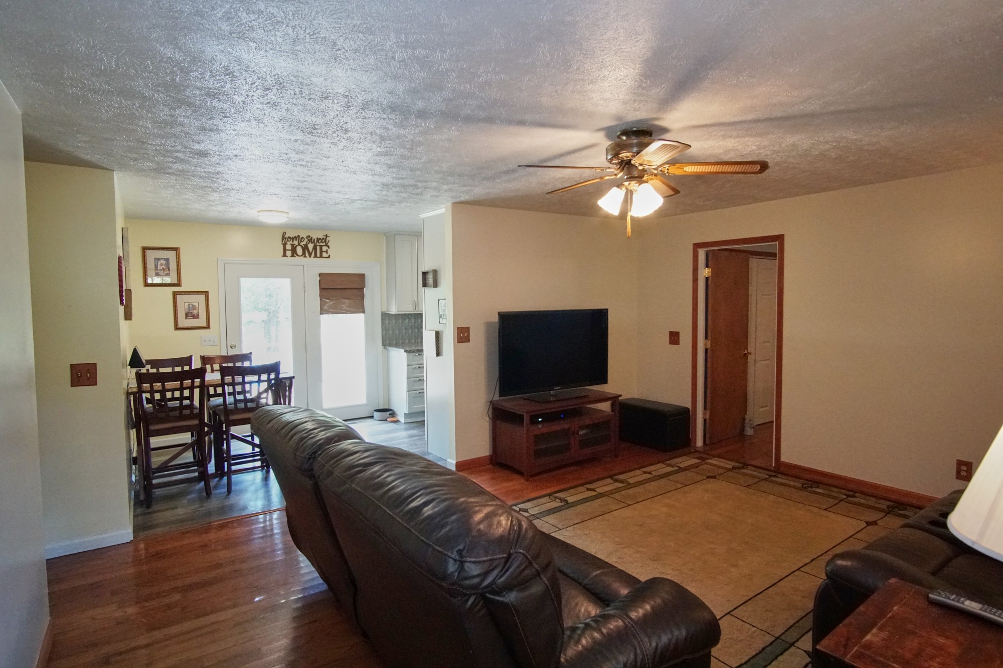 984 Claude Jones Road Murfreesboro, TN 37129 - Photo 8 of 49 a living room with furniture and a flat screen tv