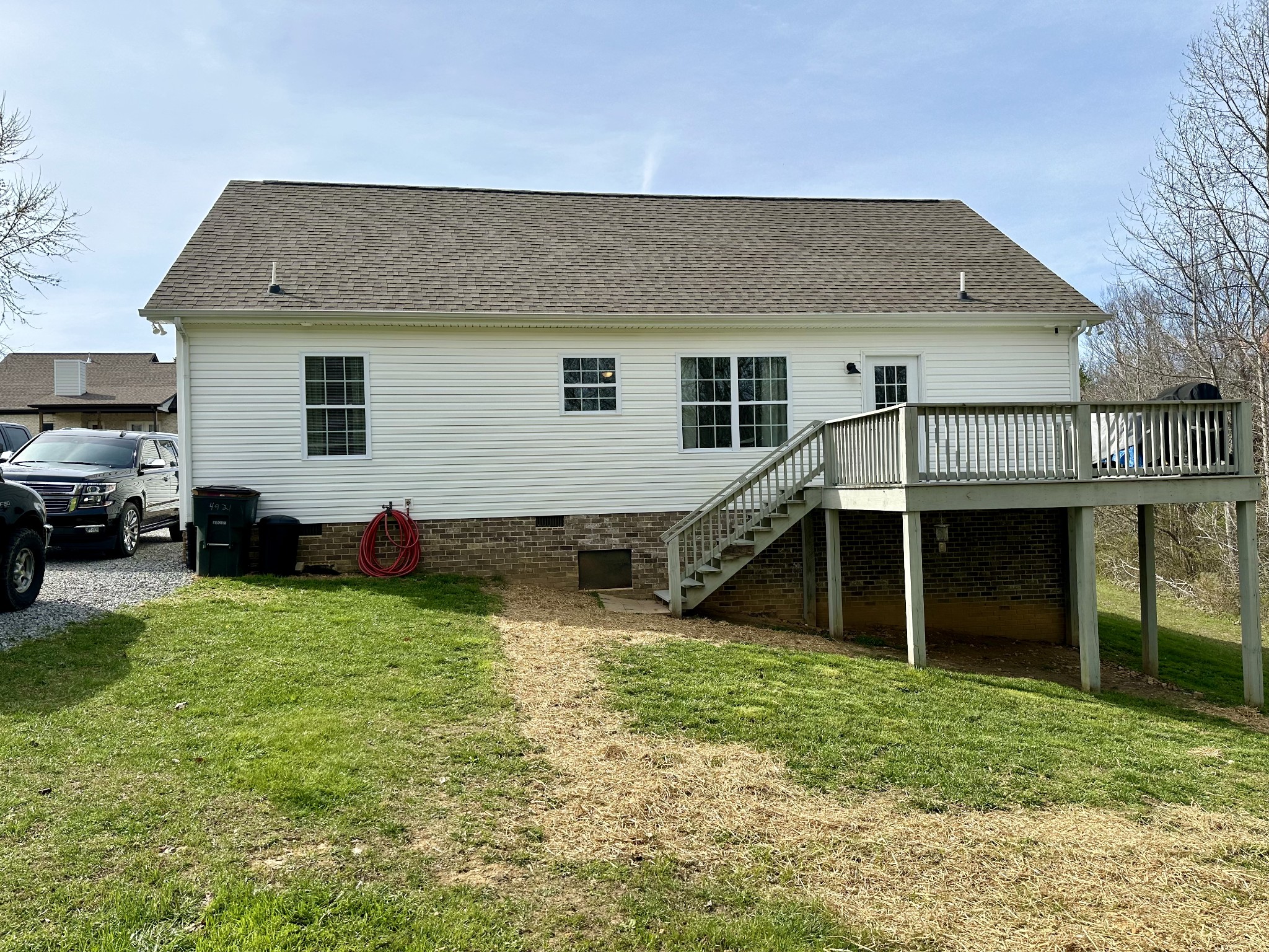 194 Mitchell Road Portland, TN 37148 - Photo 16 of 17 a front view of a house with a yard and garage