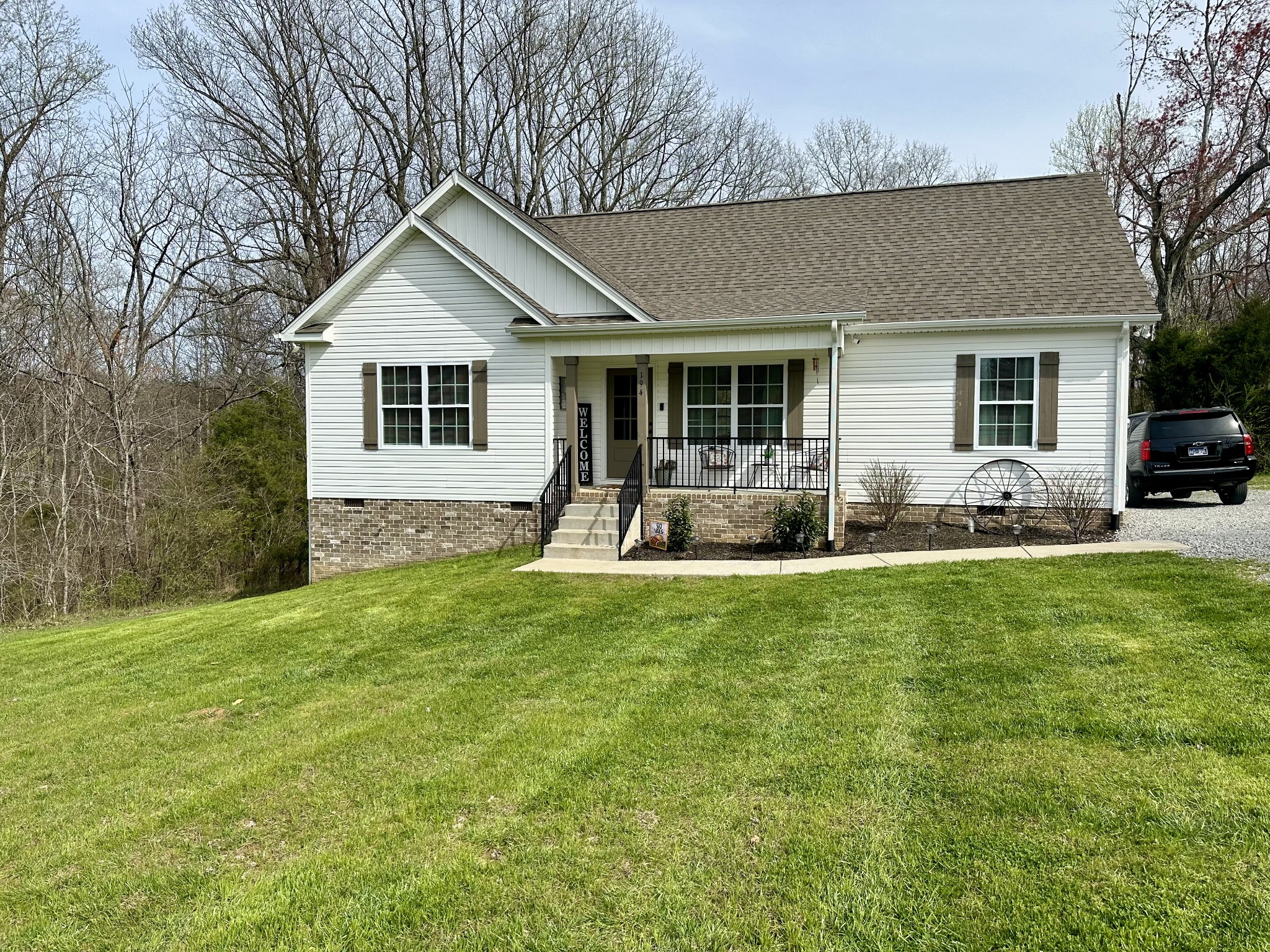 194 Mitchell Road Portland, TN 37148 - Photo 2 of 17 a front view of house with yard outdoor seating and green space