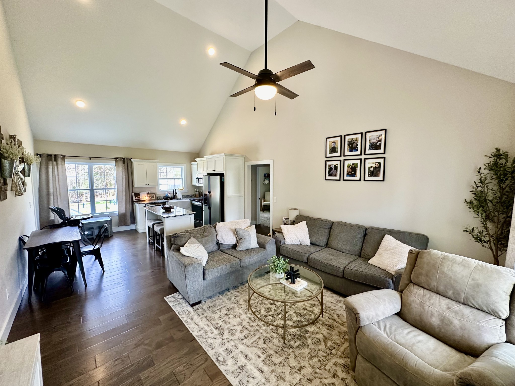 194 Mitchell Road Portland, TN 37148 - Photo 3 of 17 a living room with furniture kitchen view and a wooden floor