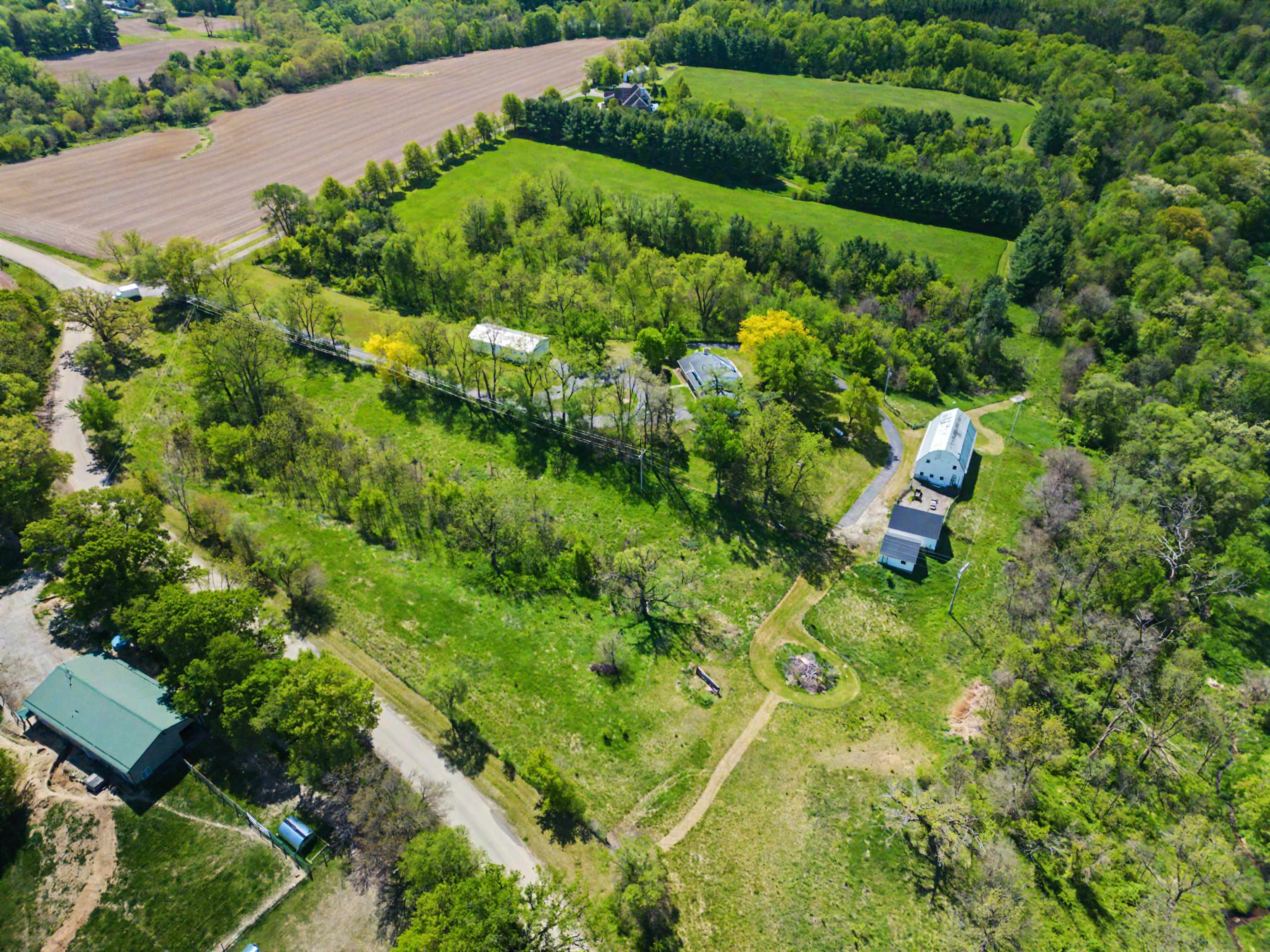17380 Corbett Road Mount Carroll, IL 61053 - Photo 60 of 65 an aerial view of a house with a yard