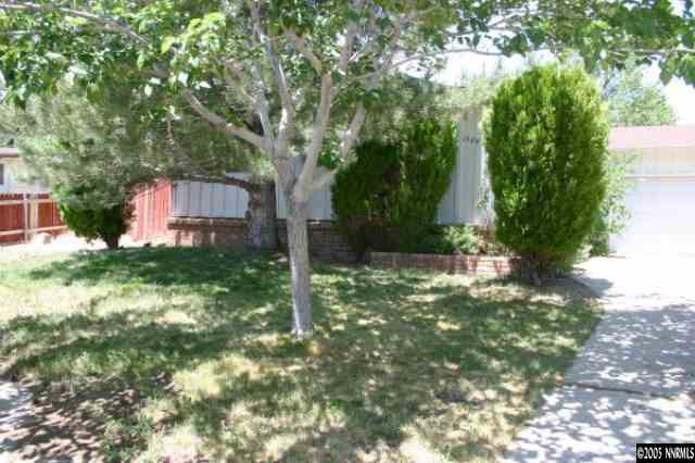 1389 Tioga Way Reno, NV 89503 - Photo 1 of 4 a backyard of a house with lots of green space