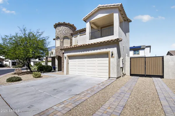 a front view of a house with a garage