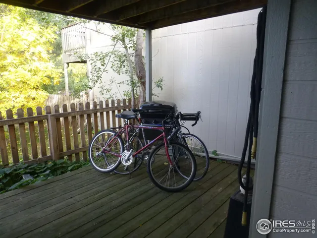 a view of door with wooden floor