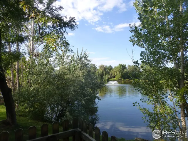 a view of lake with green space
