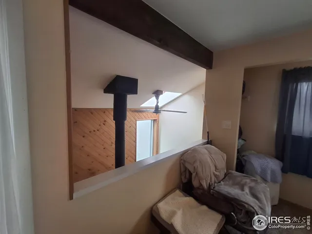 a living room with furniture and a gate