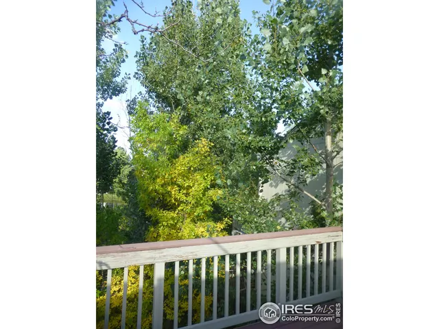 a balcony with an outdoor space