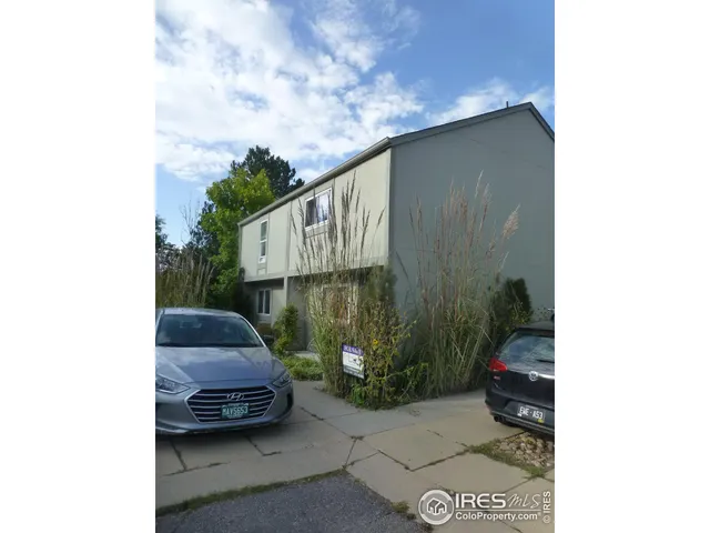 a view of a yard from a balcony